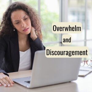 women sitting at laptop confused
